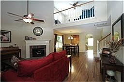 Laminate wood flooring and corner fireplace