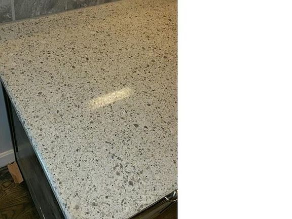 Easy To Maintain Upgraded Quartz Countertops & Custom Tile