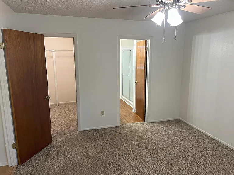 Master bedroom looking at closet and bathroom