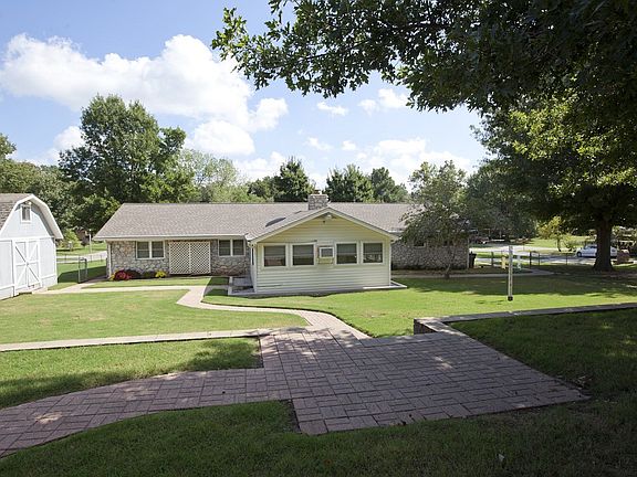 Fully Fenced, Flower Beds and Sidewalks
