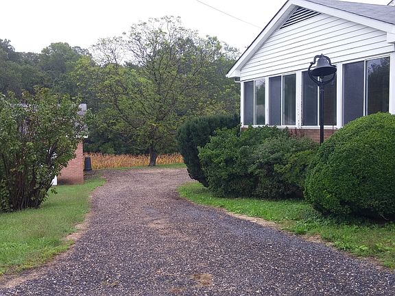 Driveway to Garage and Back of House