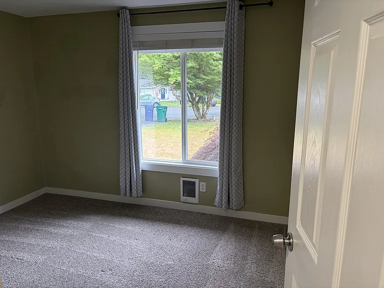 Bedroom # 2 with window facing the front yard