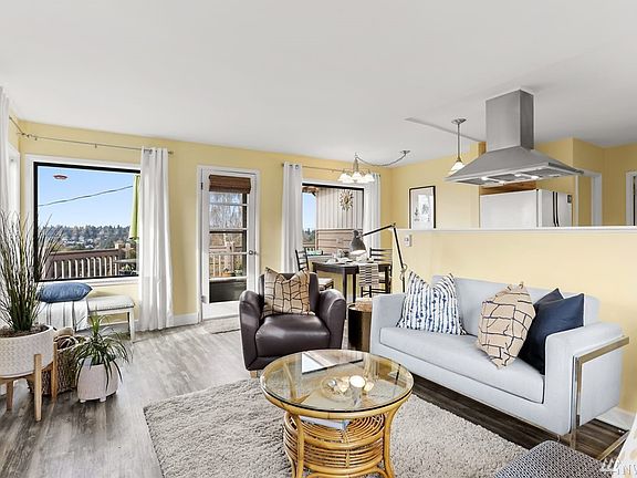 Open floorplan encompasses living, dining and kitchen areas.