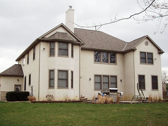rear view of the house showing the nice paver patio