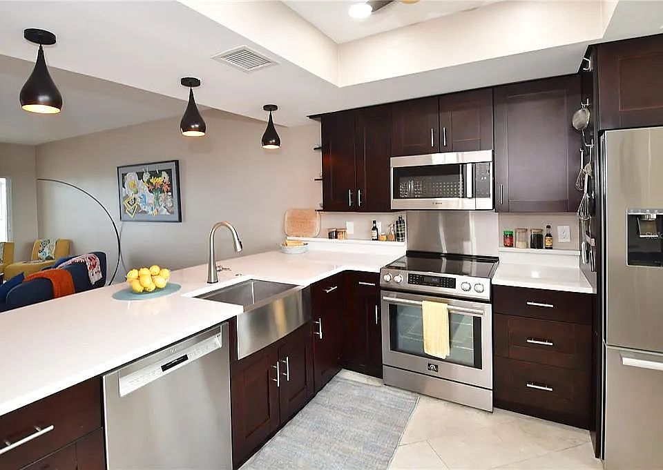 Gourmet kitchen with pantry and high end appliances.