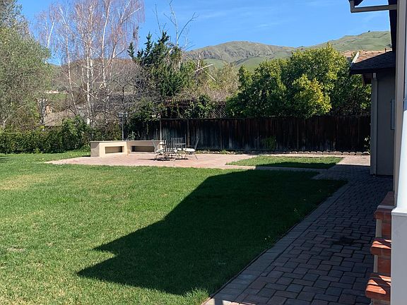 View of the left side of the house where the bbq area is.