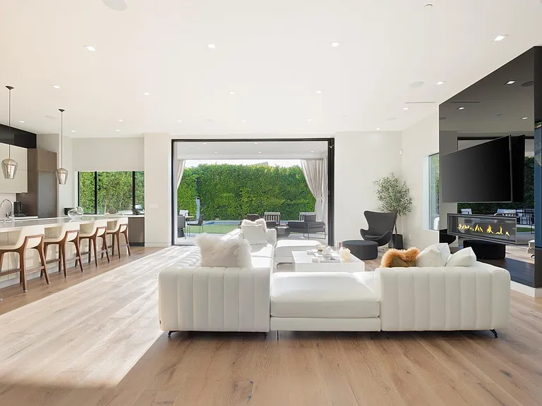 Move seamlessly to the private outdoor lounge area