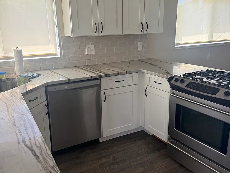 Kitchen Gas/Oven Stove
New Dishwasher