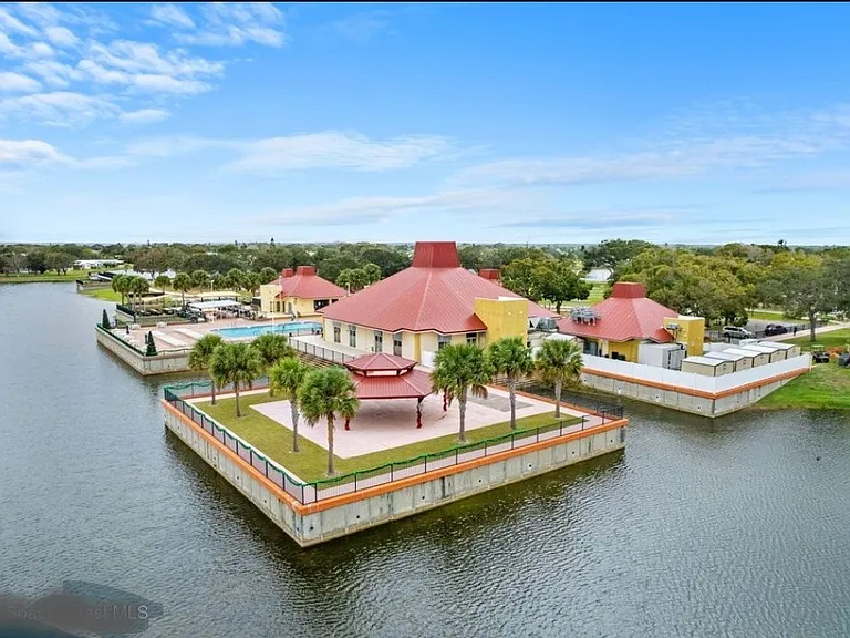Aerial view of Barefoot Bay Recreational Community - Building A and offices.