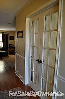 Doors to Bonus Room
						:
						Great space to be used for home office, den, play room, or formal dining room.