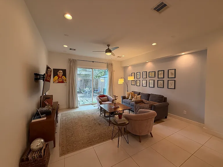 The informal "living" area with a great view of the backyard and deck!