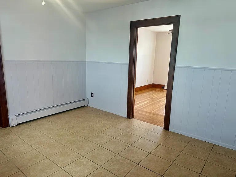 Eat-in kitchen/door to living area