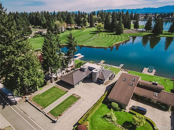 Ample sized lot offering room to roam with parking and your very own boat launch