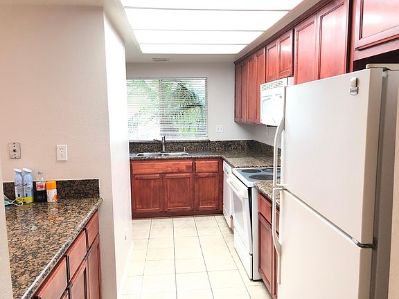 Upgraded Kitchen with all the appliances ( Refrigerator, cooking range, oven, microwave, dish washer, double sink) . With pantry and lots of extra cabinets. Granite counter top.