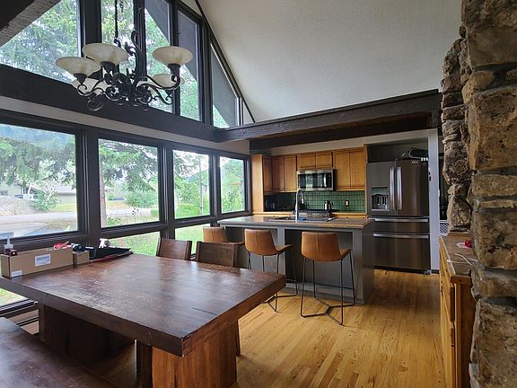 Kitchen and dining area. Pantry to the side of kitchen.