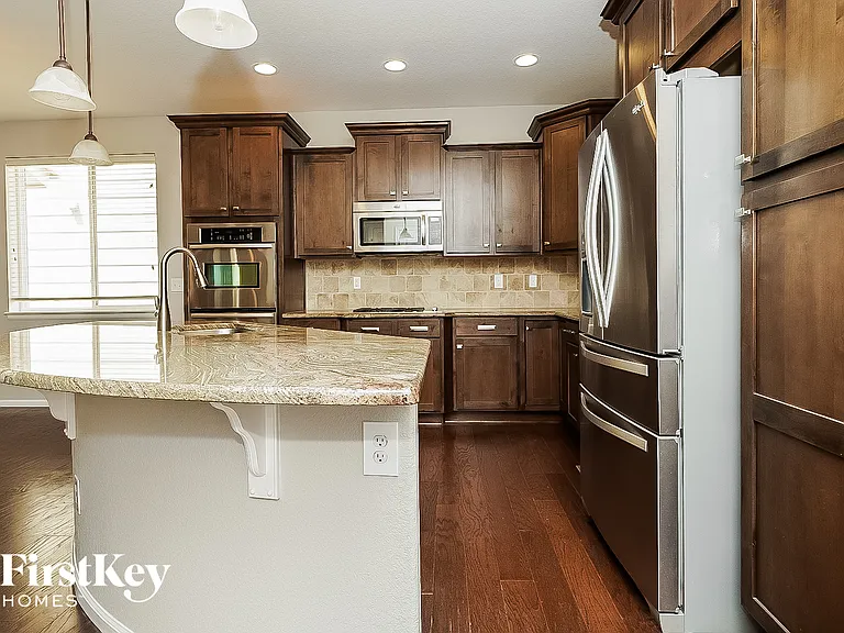 12722 E 105th Ave — Photo 6