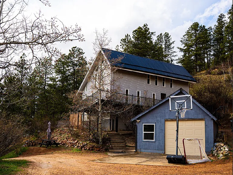 2033 Rampart Range Rd — Photo 1