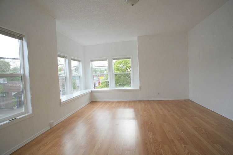apt. 2 living area with corner window seat