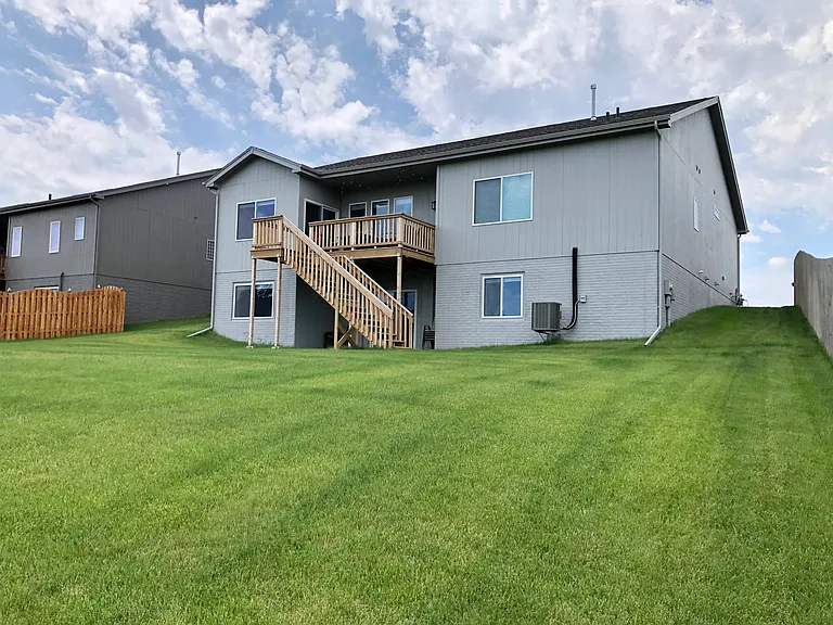 Back view of the house and backyard