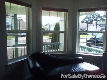 Front view bay windows : You can't beat the light with seven windows, skylights and vaulted ceilings