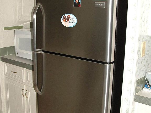 NEW STAINLESS REFRIGERATOR