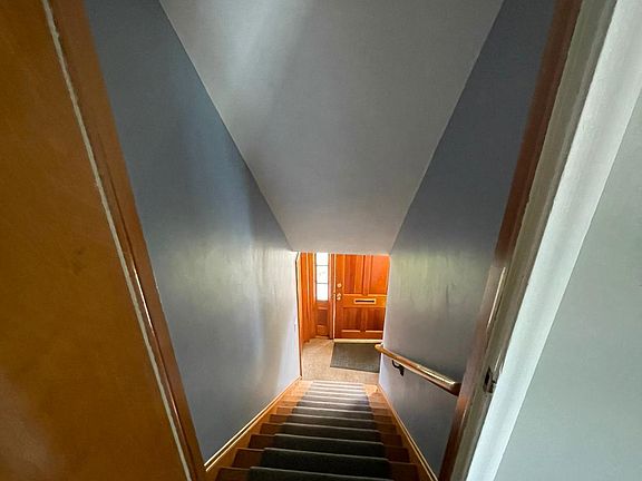 Staircase Going Up to Apartment's Main Door (as seen from main door)