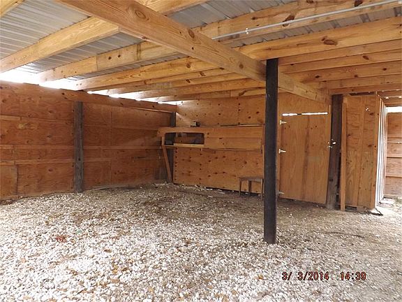 carport with hay barn in back