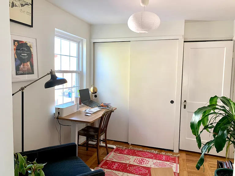 3rd bedroom has a large closet and a linen closet. Currently set up as an office and yoga room. This room connects to the primary bedroom and can also serve as a bedroom or nursery, if needed.