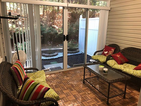 Screen room with glass sliding door and sliding screen that 