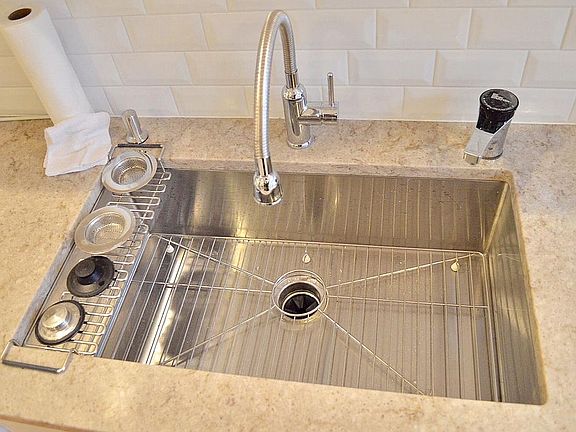 New Sink with garbage disposal and instant hot water dispenser