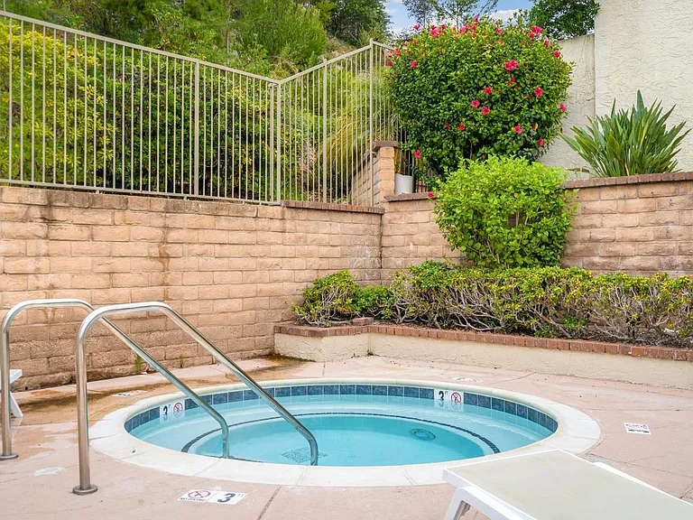 Access to the community jacuzzi (hot tub), steps away from unit.
