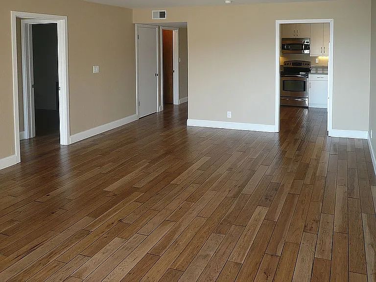 Living room fireplace is at other end