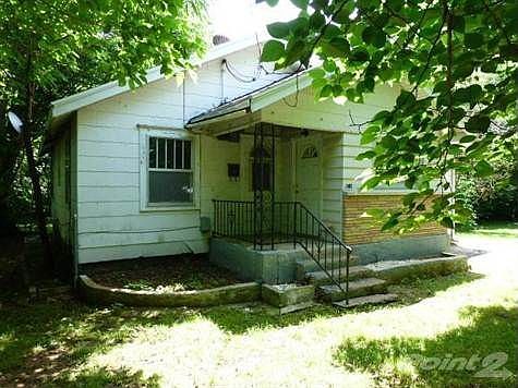 Home sits on two city lots.