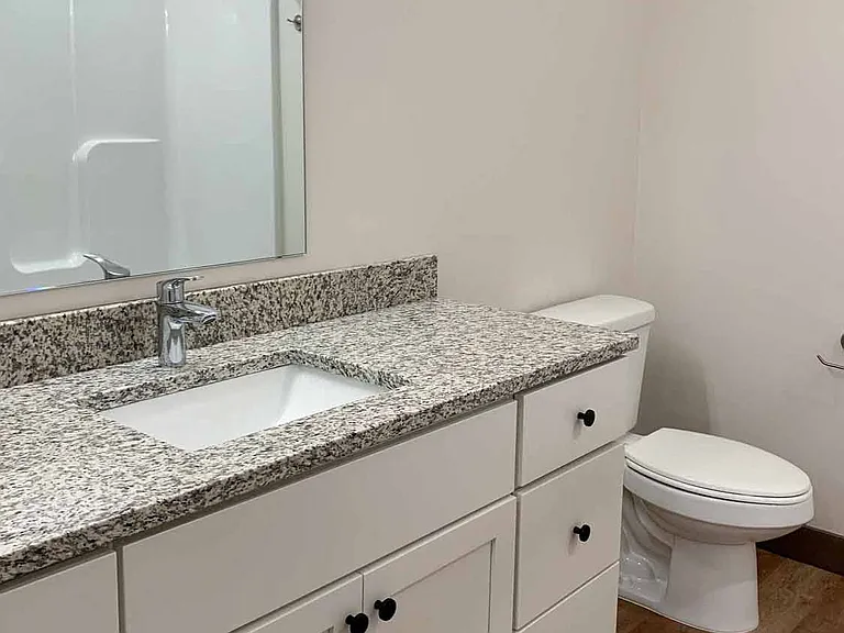 You'll love the large vanity bathroom in the Marble with light finish