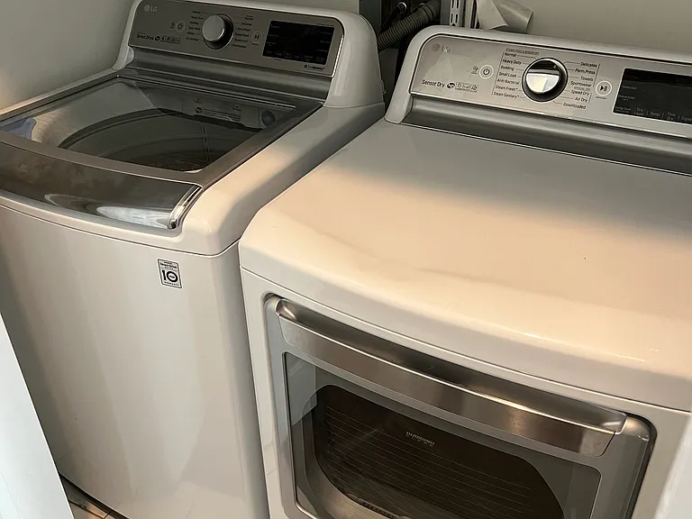 In Unit Washer/Dryer Utility Closet off Kitchen