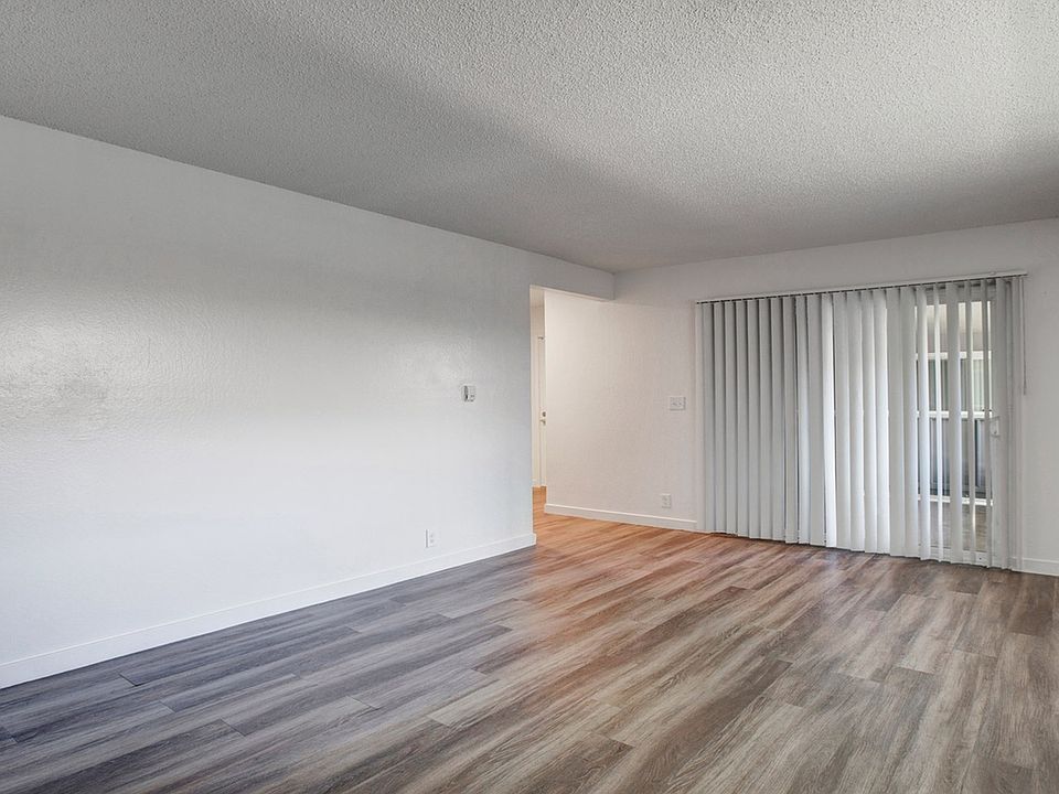 Spacious Living Room and Patio Access