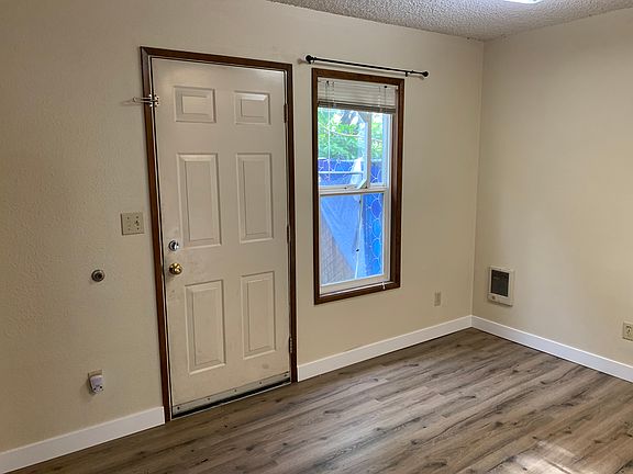 eating area to fenced backyard