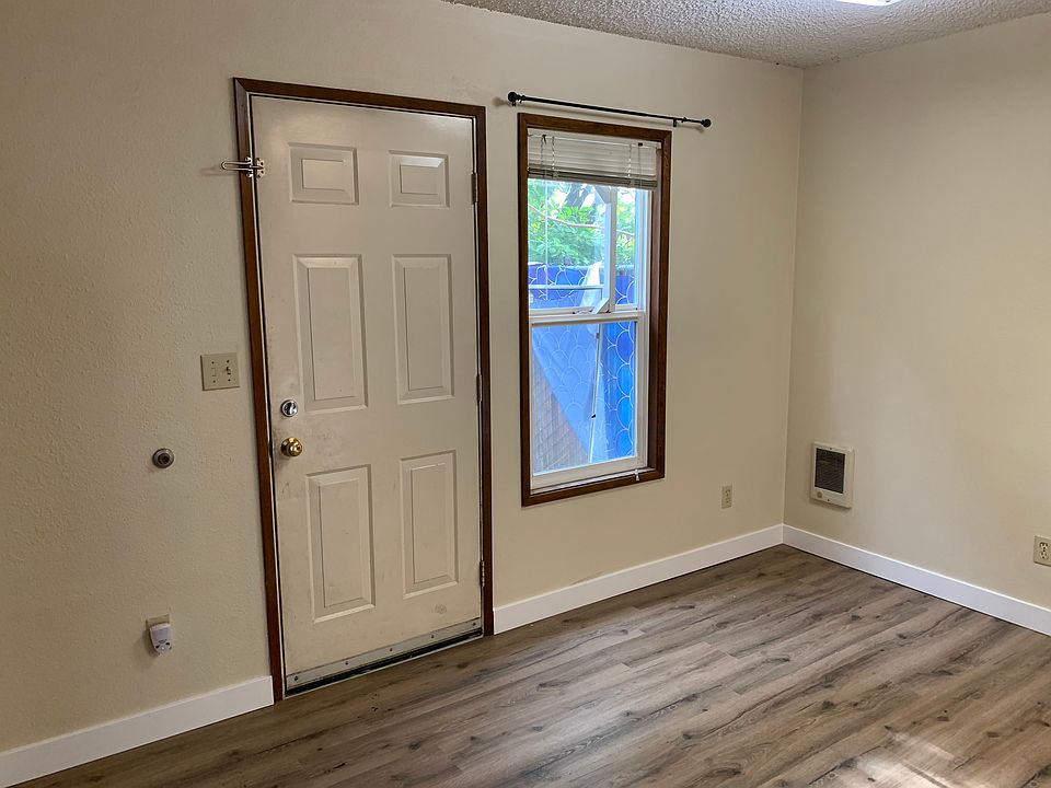 eating area to fenced backyard