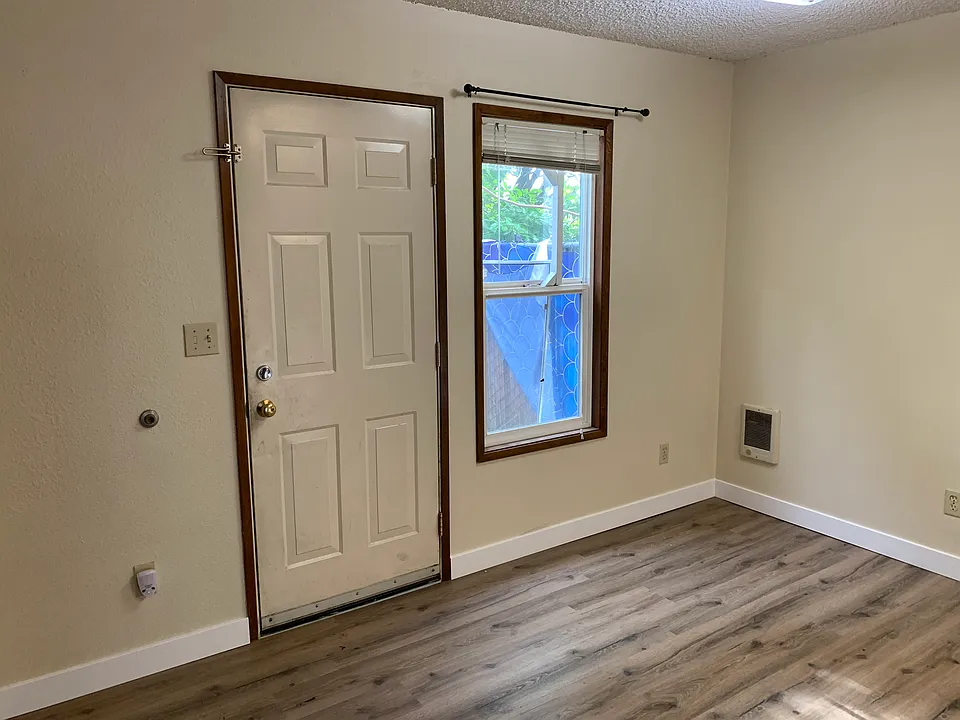 eating area to fenced backyard