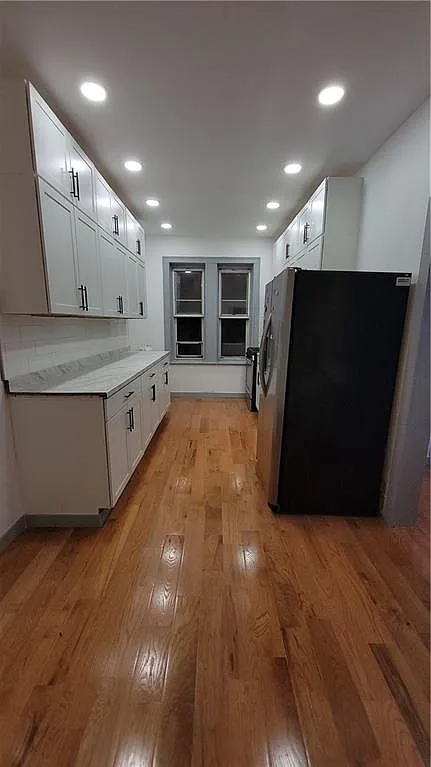4 bed, 1.0 bath, 1100 sqft, $3,753 — Photo 4