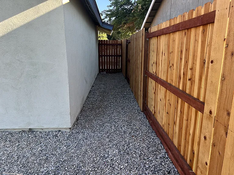NEW PRIVACY WOODEN FENCE ON WEST SIDE