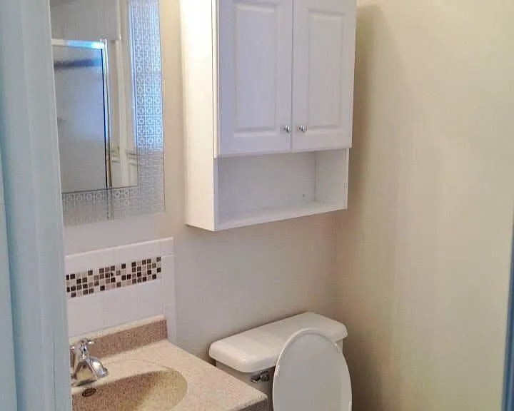 Main floor bathroom includes tiled shower