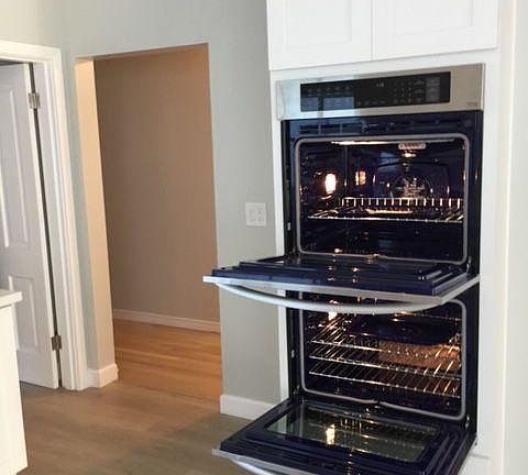 Stainless double oven, self cleaning , purple inside with air fry technology!