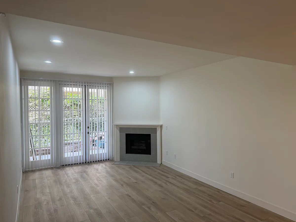 Living room / patio / fireplace - 1837 Midvale Ave #104