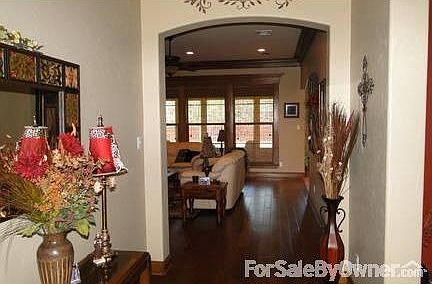 Entry hall leads to living area