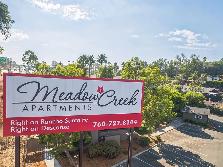 An aerial view of our Billboard Sign leading you home to Meadow Creek Apartments in San Marcos, CA