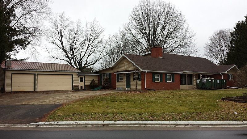 Street View : New street, utilities, curb, gutter, and new shingles (old shingles removed).