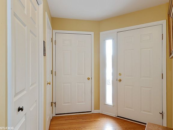Hardwood floors, entry closet, access to garage and basement.
