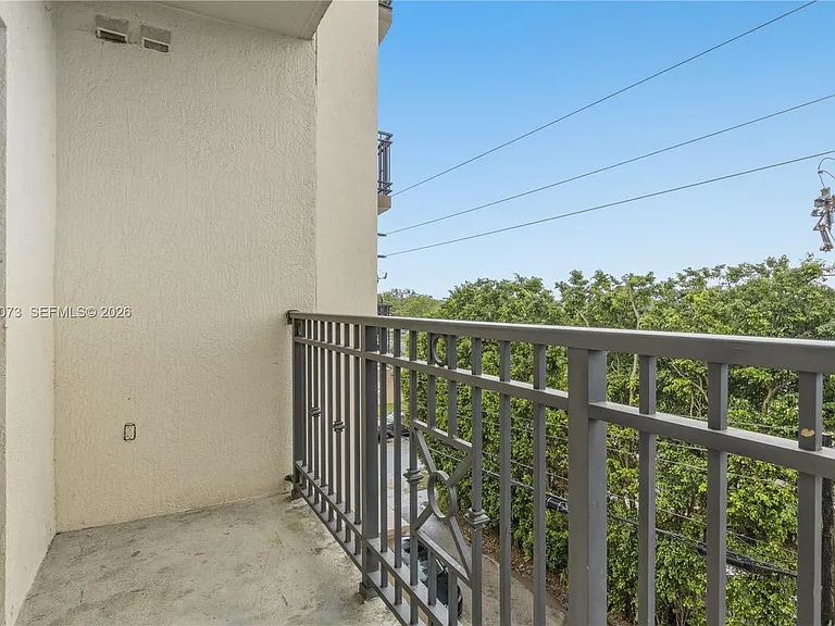 5271 SW 8th St #304 — Photo 13