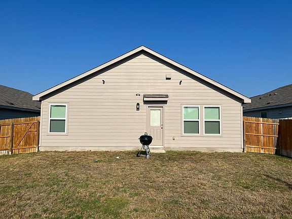 Backyard is very spacious and security cameras